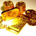золотые слитки и монеты